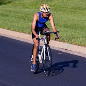 Triathlons, which include swimming, biking, and running.